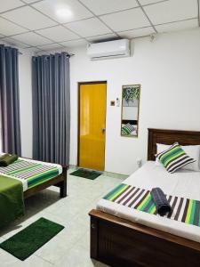 Un pat sau paturi într-o cameră la Sonora