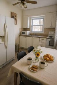 Kuchyň nebo kuchyňský kout v ubytování Espace Cozy - 2 bed