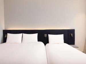 ibis Ambassador Seoul Insadong-Newly renovated in 2025にあるベッド