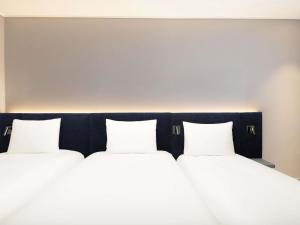 ibis Ambassador Seoul Insadong-Newly renovated in 2025にあるベッド