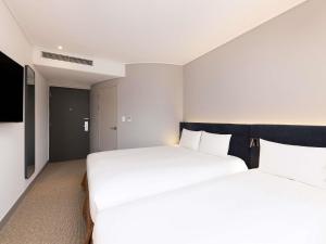 ibis Ambassador Seoul Insadong-Newly renovated in 2025にあるベッド