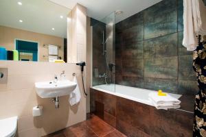 Ένα μπάνιο στο Go Hotel Shnelli