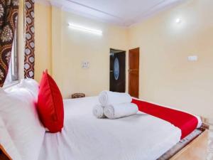Voodi või voodid majutusasutuse Hotel O Smart View toas