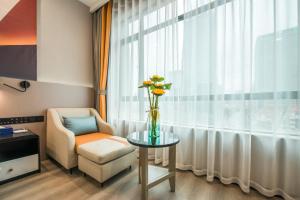 Istumisnurk majutusasutuses Xiyueliang Hotel Kunming South Asian Style First City Branch