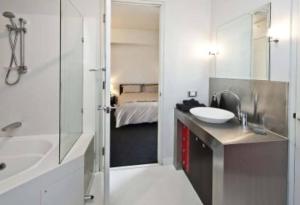 Ένα ή περισσότερα κρεβάτια σε δωμάτιο στο Luxury Apartment in the heart of Perth CBD