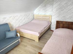 Postel nebo postele na pokoji v ubytování Guest house Family