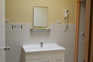 Koupelna v ubytování Chadstone Executive Motel