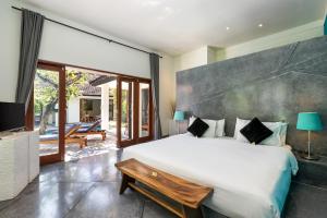 Postel nebo postele na pokoji v ubytování Andaman By Kerta Living + 53 fotografií