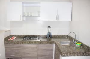 Kuchyň nebo kuchyňský kout v ubytování Apartamento en Valledupar - Casa Canaán + 31 fotografií