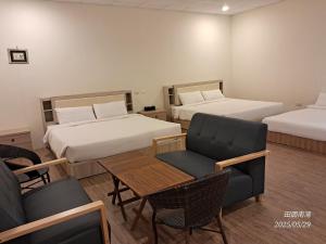 Postel nebo postele na pokoji v ubytování Tianyuan Nanwan Homestay