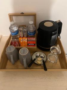 a drawer with a coffee maker and a toaster at The Bungalow by SJP Kettering in Kettering