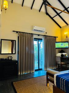 Postel nebo postele na pokoji v ubytování Foresta Resort Sigiriya