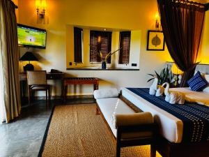 TV a/nebo společenská místnost v ubytování Foresta Resort Sigiriya