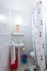 Ένα μπάνιο στο Rooms Molabeciri