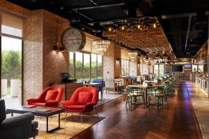 Posezení v ubytování Hyatt Place Jaipur Malviya Nagar