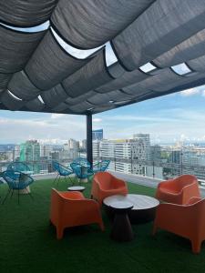 Posezení v ubytování Minimalist Condo unit in the heart of Cebu at The Median + 8 fotografií