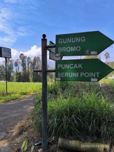 a street sign on the side of a road at Elen Villa by ABM in Ngadisari
