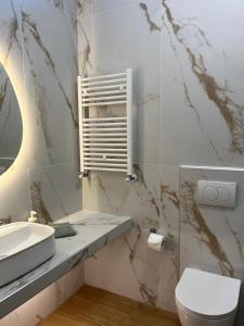 Koupelna v ubytování Tilemaxos Apartment