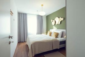 Voodi või voodid majutusasutuse LeonArt Living 41 toas