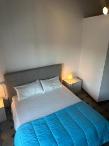 Postel nebo postele na pokoji v ubytování Lungarno Suite