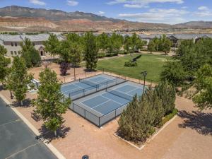 an overhead view of two tennis courts in a park at The Ella home in Hurricane