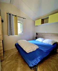 Postel nebo postele na pokoji v ubytování Camping de la Bonnette