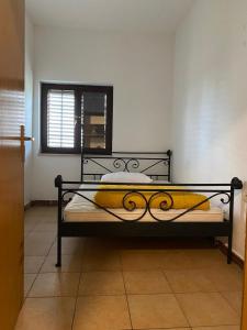 Ένα ή περισσότερα κρεβάτια σε δωμάτιο στο Apartman Green Hill 2