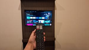 TV a/nebo společenská místnost v ubytování Yuwono Hotel & Villa Malioboro