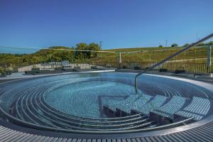 Piscina di Hotel Essence o nelle vicinanze