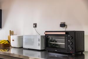 Cucina o angolo cottura di Dali Yunqi Wangyue丨Guanshan Luxiao Ancient City Resort