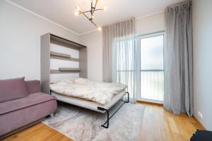 Postel nebo postele na pokoji v ubytování Simple Stay at Katusepapi