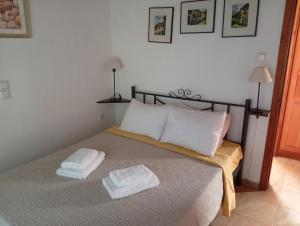 Posteľ alebo postele v izbe v ubytovaní Villa Georgina B&B