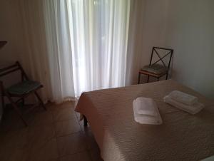 Posteľ alebo postele v izbe v ubytovaní Villa Georgina B&B