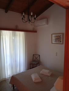 Posteľ alebo postele v izbe v ubytovaní Villa Georgina B&B