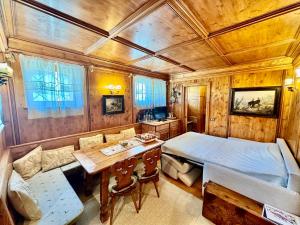 Postel nebo postele na pokoji v ubytování Ca del Rio - Cortina