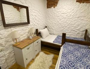 Ένα ή περισσότερα κρεβάτια σε δωμάτιο στο Apartman Kod Frana