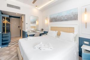 Postel nebo postele na pokoji v ubytování Corfu Mare Hotel -Adults only