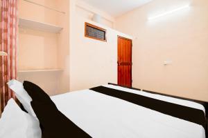 Posteľ alebo postele v izbe v ubytovaní Hotel O G.D Guest House