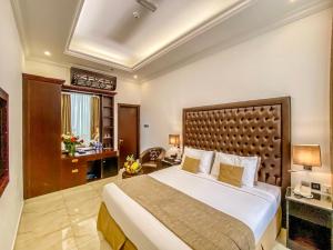 Postel nebo postele na pokoji v ubytování Mirage Bab Al Bahr Hotel