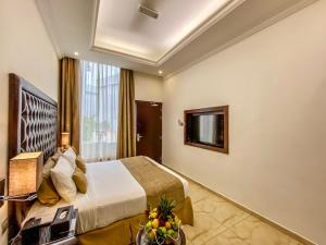 Postel nebo postele na pokoji v ubytování Mirage Bab Al Bahr Hotel