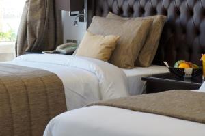 Postel nebo postele na pokoji v ubytování Mirage Bab Al Bahr Hotel