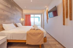 Postel nebo postele na pokoji v ubytování Arte Hotel