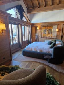Ένα ή περισσότερα κρεβάτια σε δωμάτιο στο Luxe - Chalet Meribel Les Allues 10p 4BDR 4 BTHR