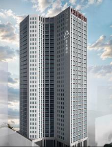 a rendering of a tall white building at Atour Hotel Chongqing Grand Hall Jialing River Riverside Road in Chongqing