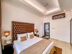 Postel nebo postele na pokoji v ubytování Mirage Bab Al Bahr Hotel