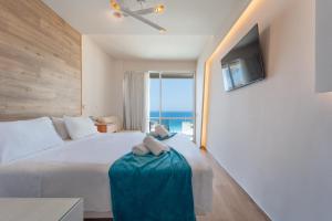 Postel nebo postele na pokoji v ubytování Arte Hotel