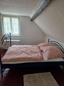 Ένα ή περισσότερα κρεβάτια σε δωμάτιο στο Haus Paula