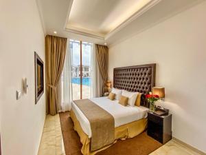 Postel nebo postele na pokoji v ubytování Mirage Bab Al Bahr Hotel