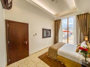 Postel nebo postele na pokoji v ubytování Mirage Bab Al Bahr Hotel