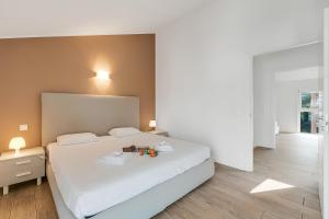 Una cama o camas en una habitación de Viganello Modern Apartments